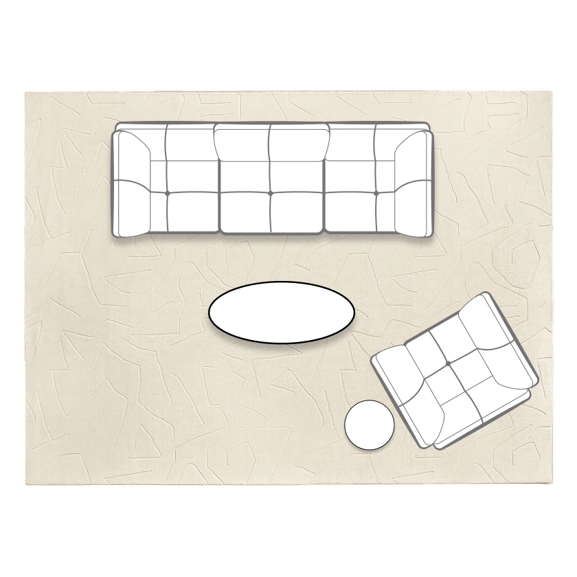 Living room floor plan layout for small spaces featuring a linear modular Reina sofa, oval coffee table, and an accent armchair on a neutral area rug.