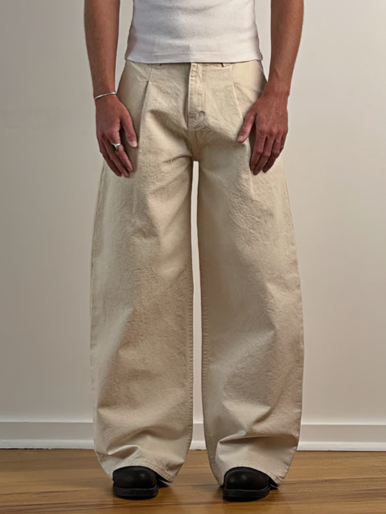 PLEATED WIDE-LEG TROUSERS