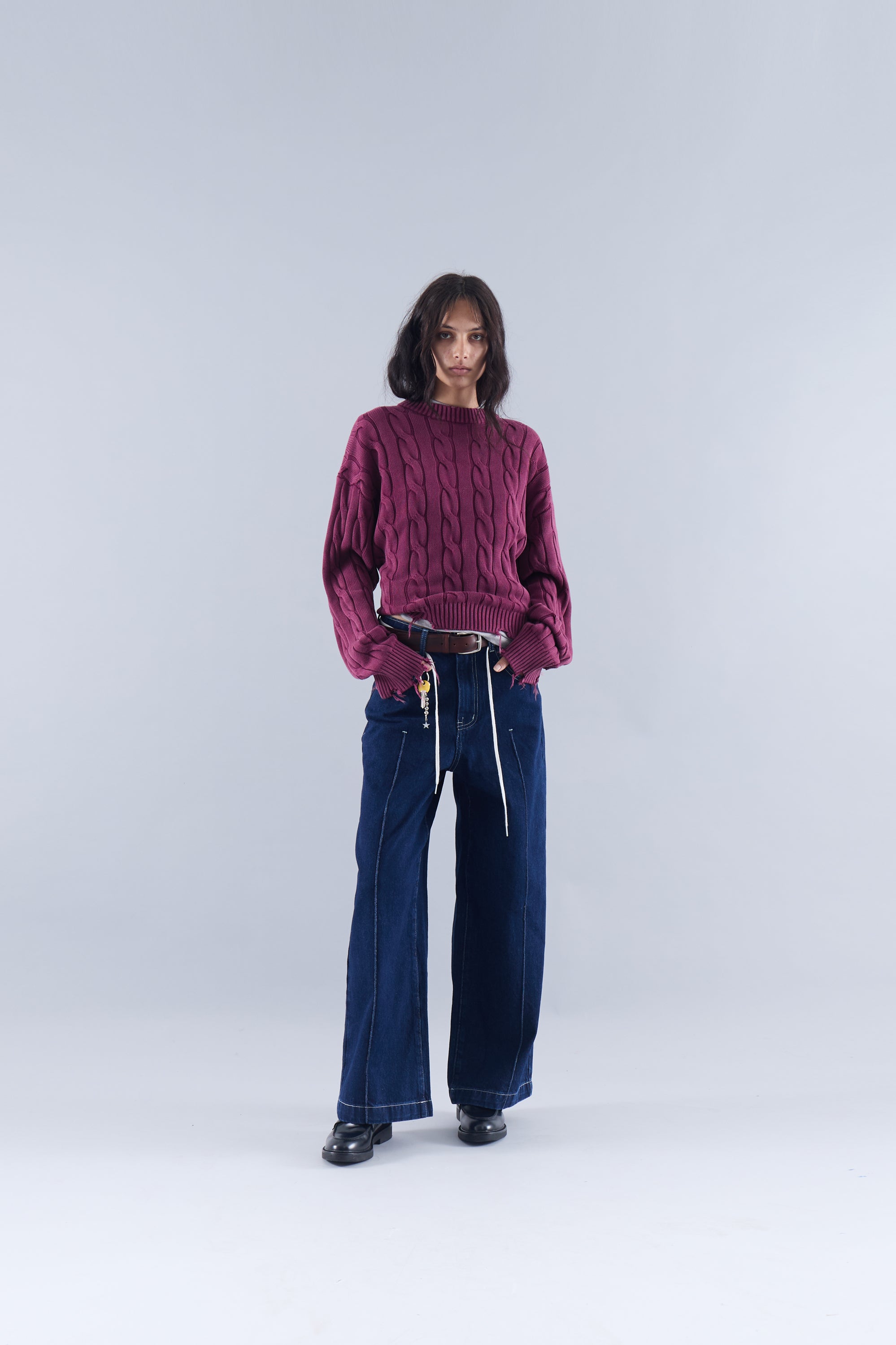 CABLE KNIT DISTRESSED SWEATER