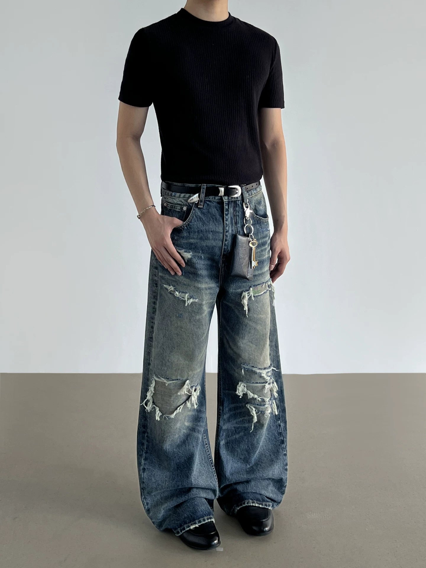 DISTRESSED WIDE DENIM JEANS