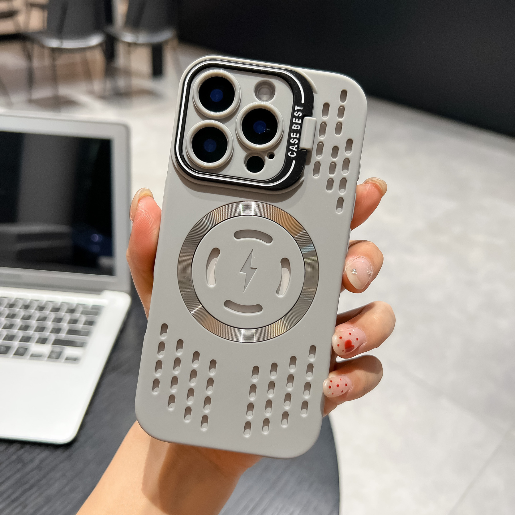 A heat-dissipating and breathable phone case drop protection case with a magnetic lens mount suitable for Apple.