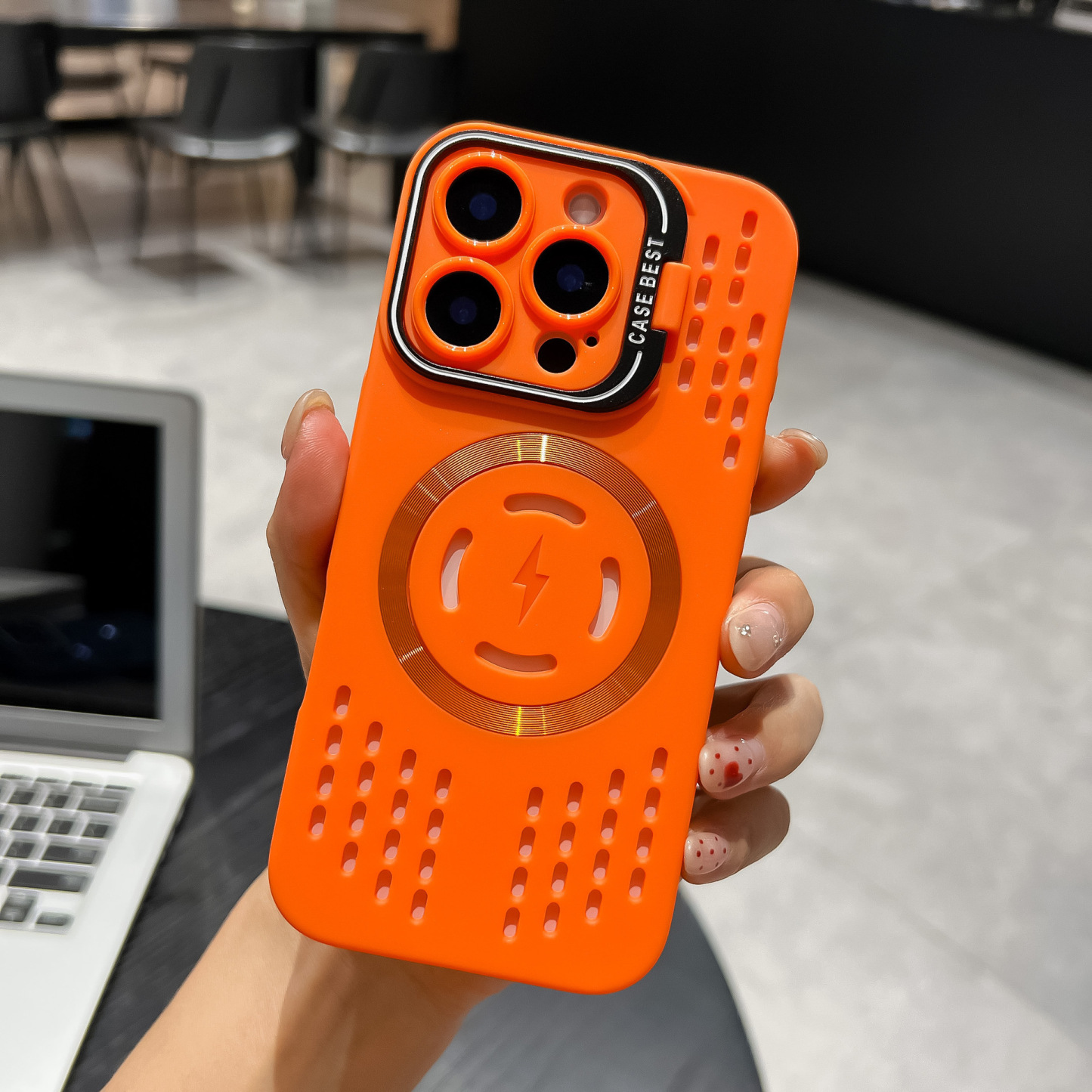 A heat-dissipating and breathable phone case drop protection case with a magnetic lens mount suitable for Apple.
