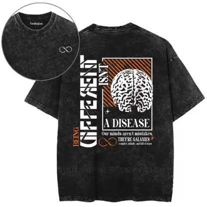 BEING DIFFERENT ISN’T A DISEASE Washed T-shirt