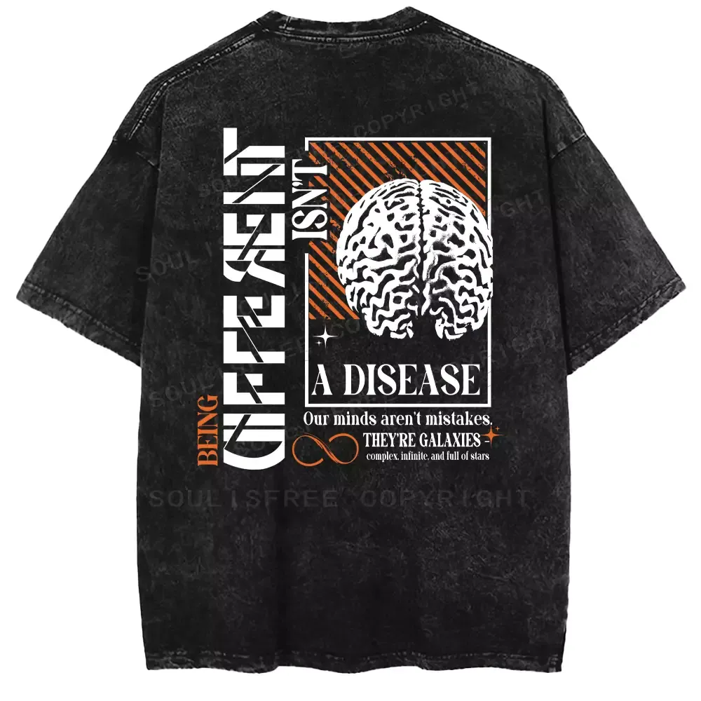 BEING DIFFERENT ISN’T A DISEASE Washed T-shirt