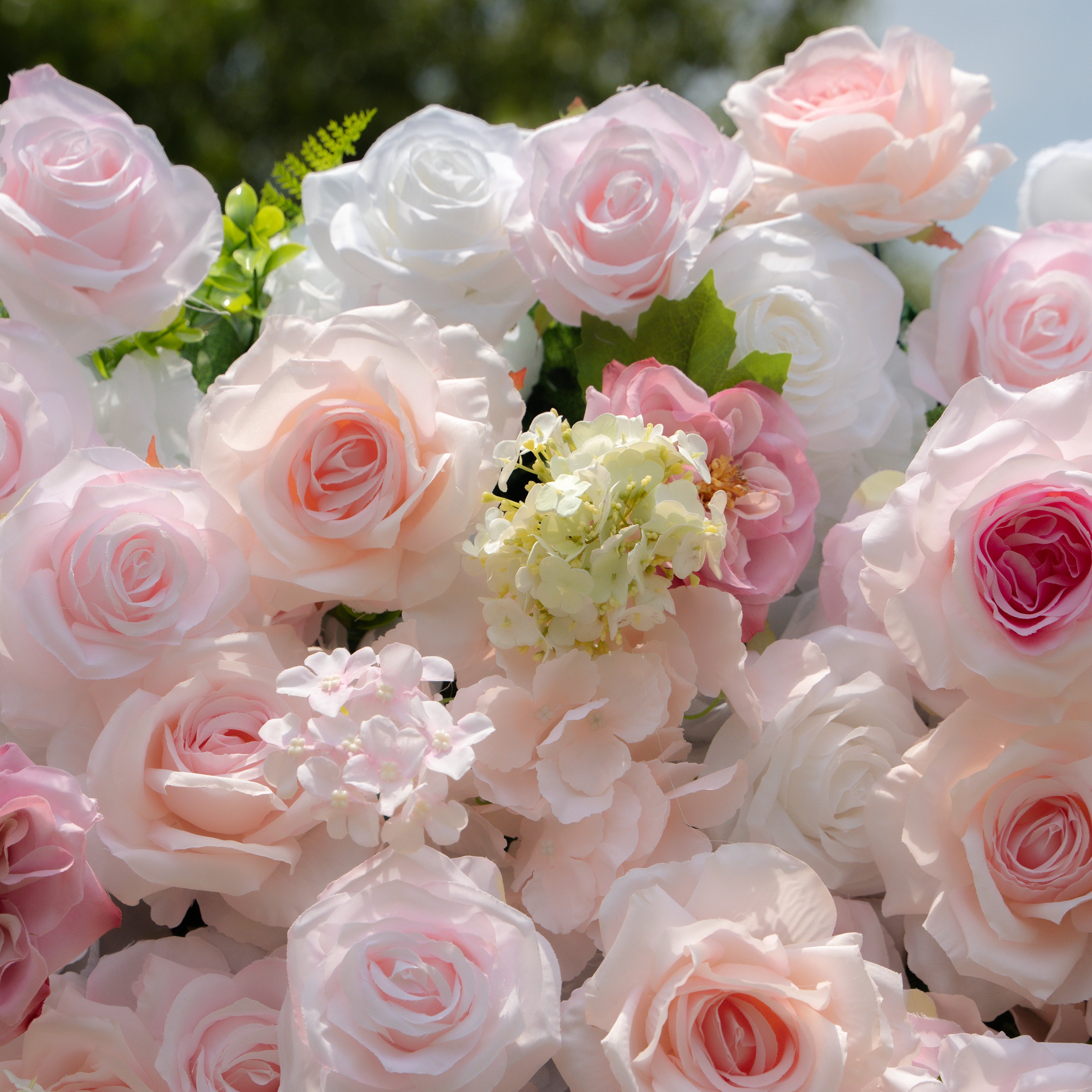 Chelsea：4D Fabric Artificial rolling up curtain flower wall