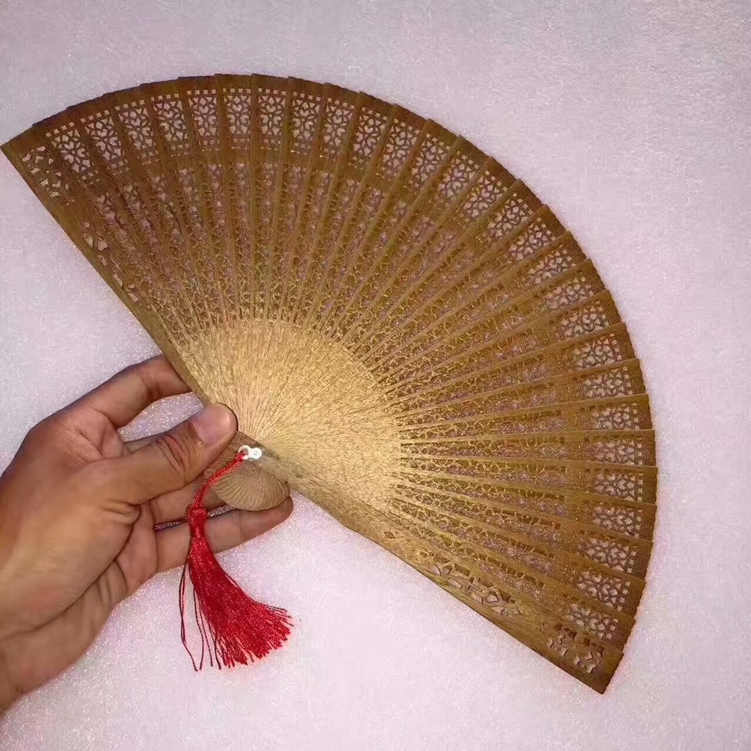 Gold-stained camphor wood folding fan