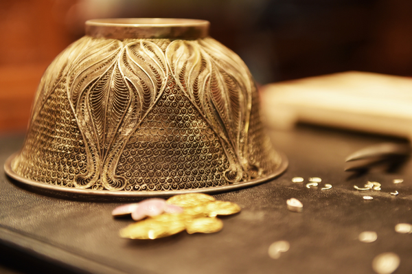 A silver bowl made with filigree inlay techniques