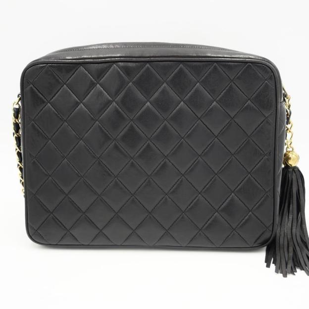 Chanel chain shoulder bag in black lambskin with turnlock strap