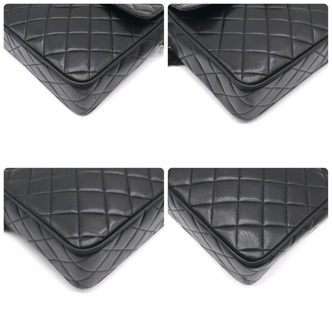 Chanel chain shoulder bag in black lambskin with turnlock strap