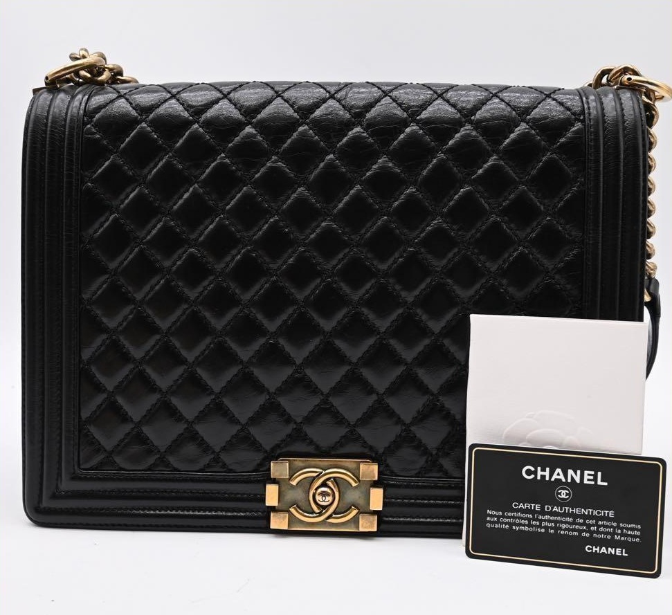CHANEL Boy Chanel calfskin black and gold shoulder bag
