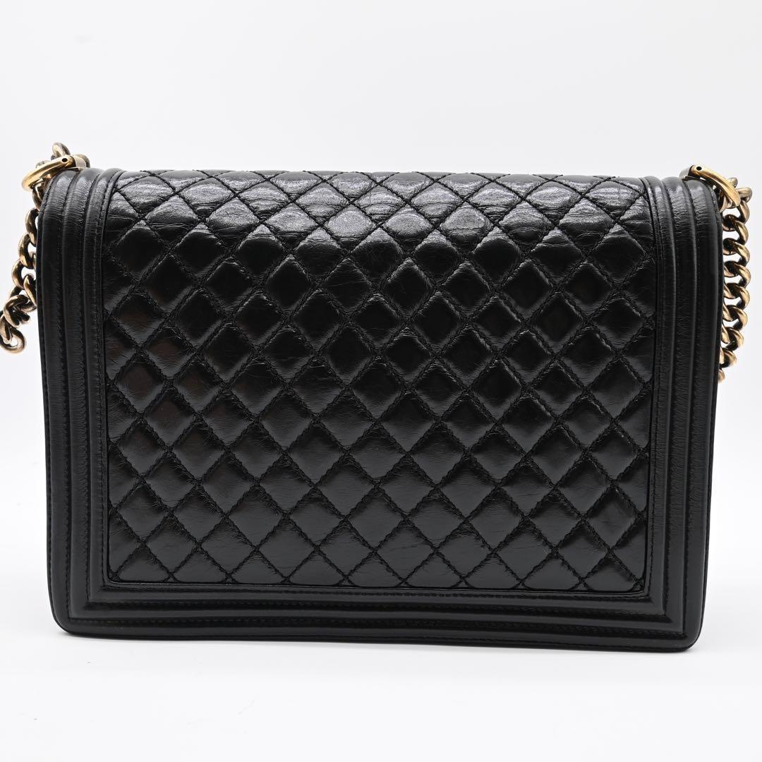CHANEL Boy Chanel calfskin black and gold shoulder bag