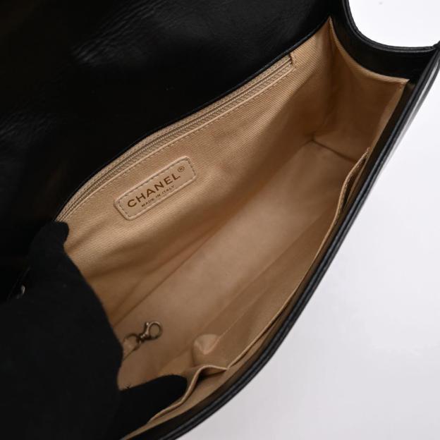 CHANEL Boy Chanel calfskin black and gold shoulder bag