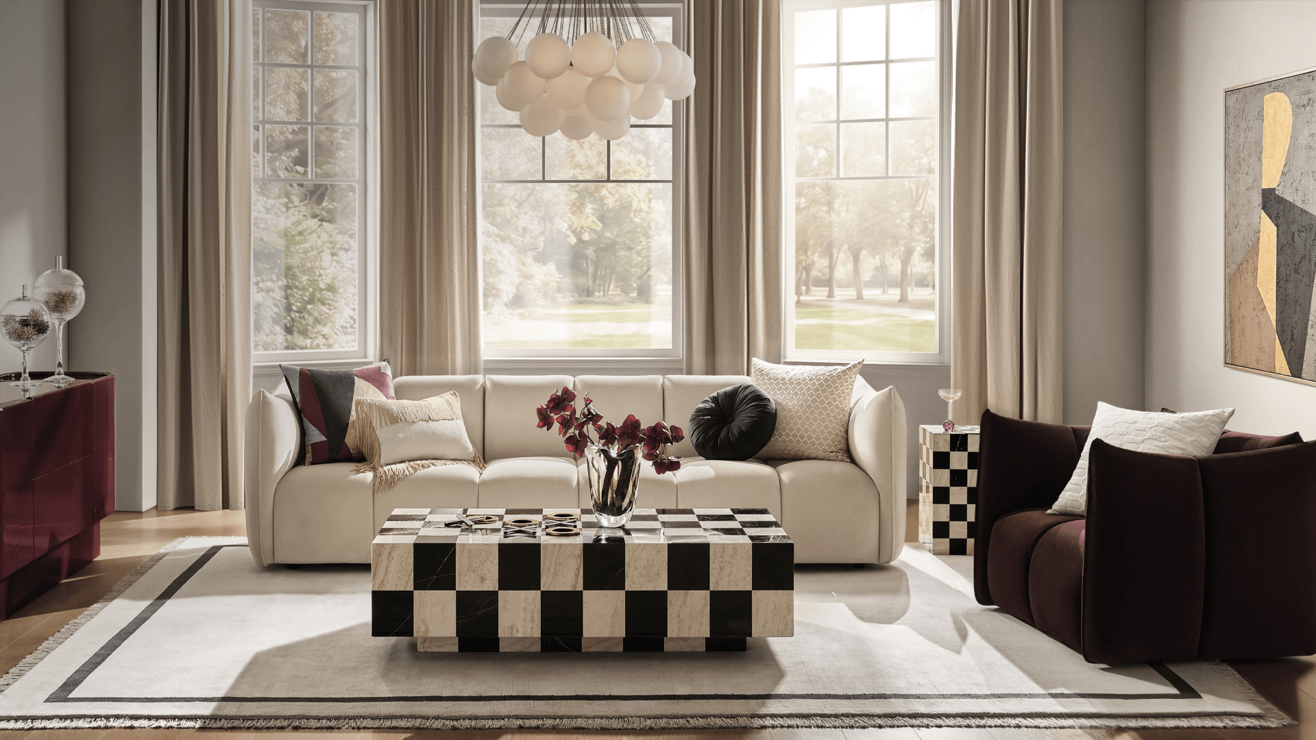 Modern luxury living room featuring a cream upholstered curved sofa, checkered marble coffee table, deep plum velvet accent armchair, spherical frosted glass chandelier, and framed abstract wall art.
