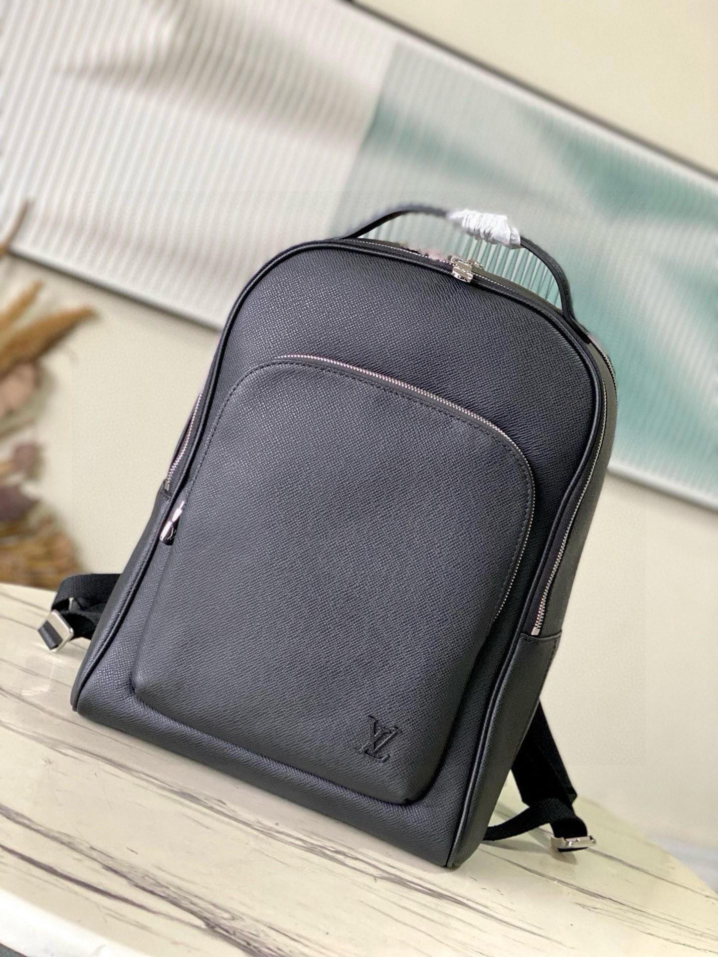 Cross-patterned Avenue backpack with Taiga leather with cowhide and metal parts