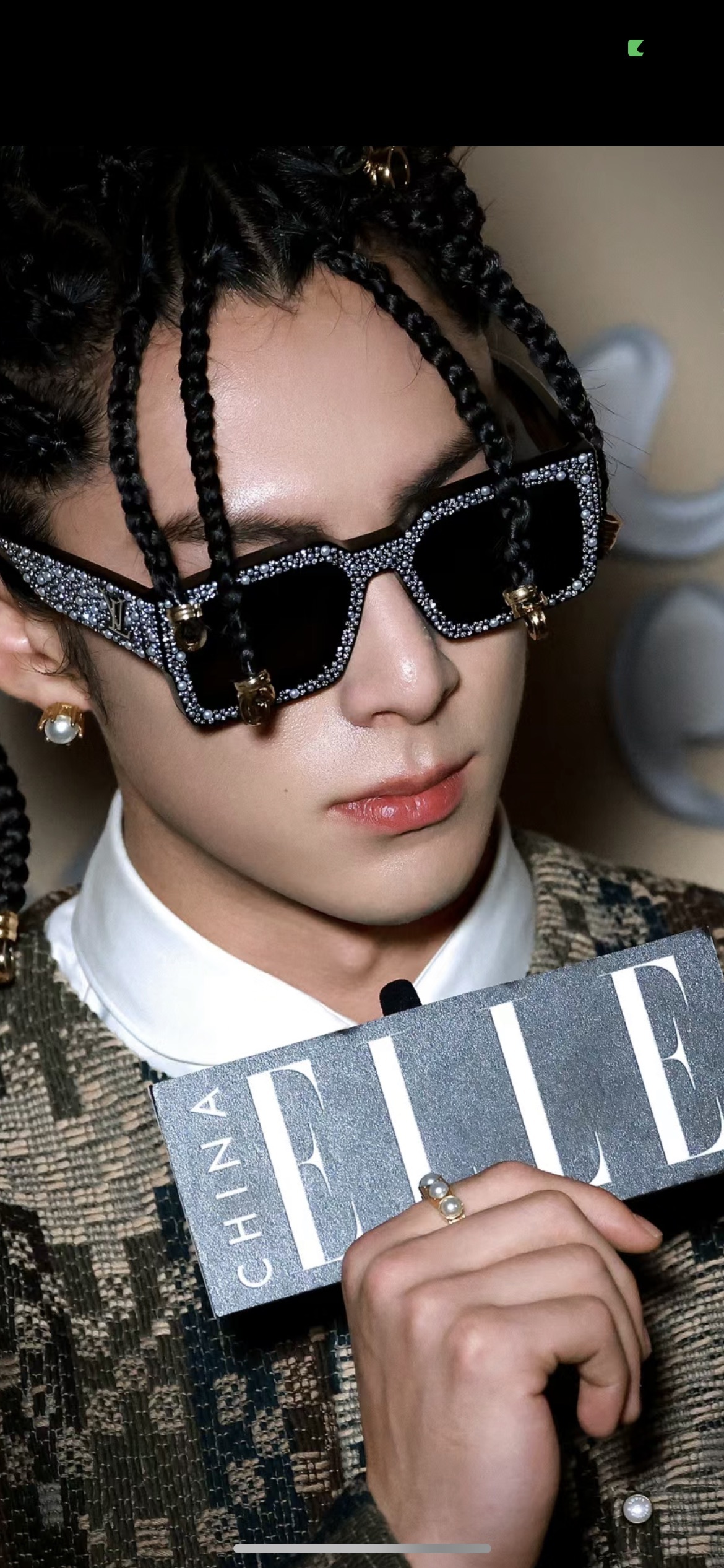 The Milky Way hairstyle is so cool. LV doesn't follow the usual path but totally pulls it off.Glasses
