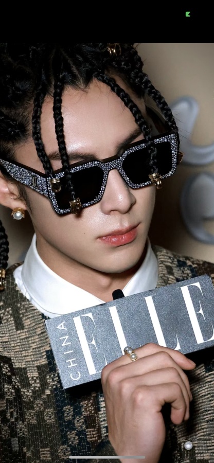 The Milky Way hairstyle is so cool. LV doesn't follow the usual path but totally pulls it off.Glasses