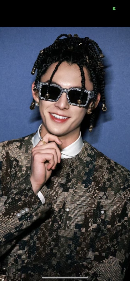 The Milky Way hairstyle is so cool. LV doesn't follow the usual path but totally pulls it off.Glasses