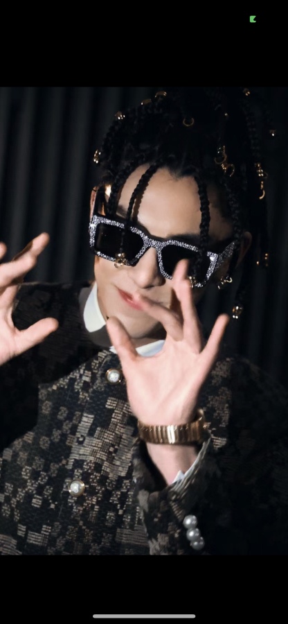 The Milky Way hairstyle is so cool. LV doesn't follow the usual path but totally pulls it off.Glasses