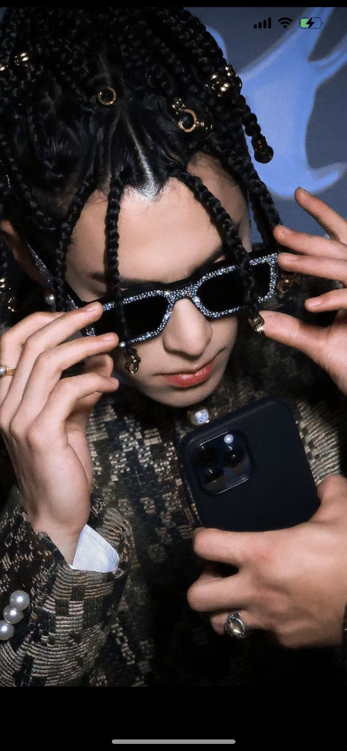 The Milky Way hairstyle is so cool. LV doesn't follow the usual path but totally pulls it off.Glasses