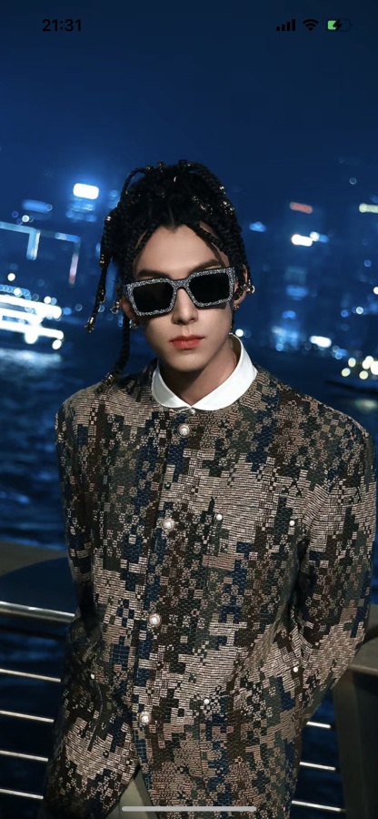 The Milky Way hairstyle is so cool. LV doesn't follow the usual path but totally pulls it off.Glasses