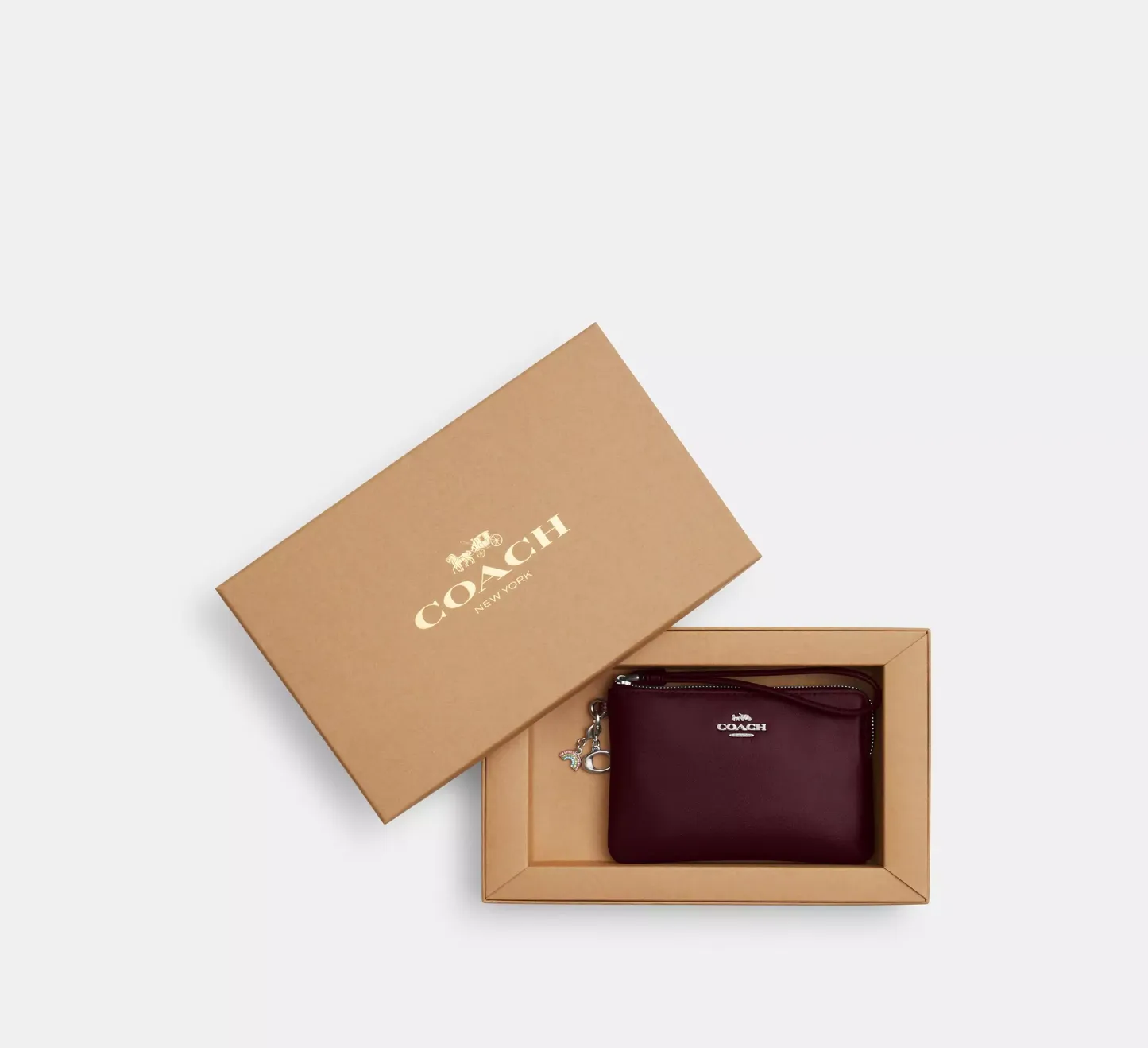 Boxed Corner Zip Wristlet In Signature Canvas With Charms