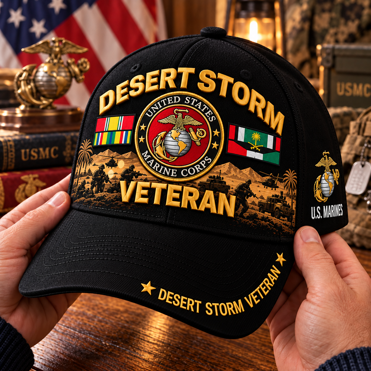 Close view of a Marine Corps Desert Storm cap held in two hands, showing front artwork and brim lettering