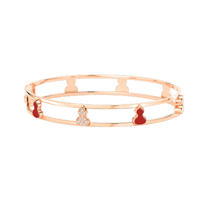 Wulu bangle in 18K rose gold with diamonds and red agate