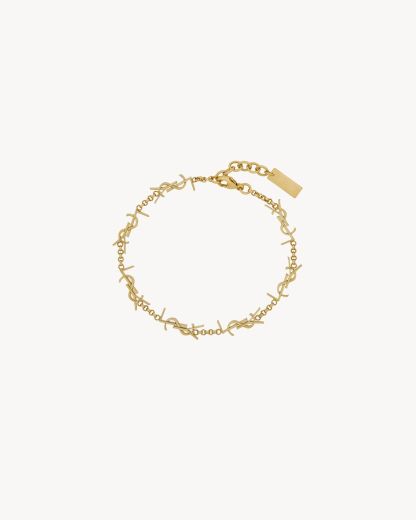 CASSANDRE multi-charm bracelet in metal