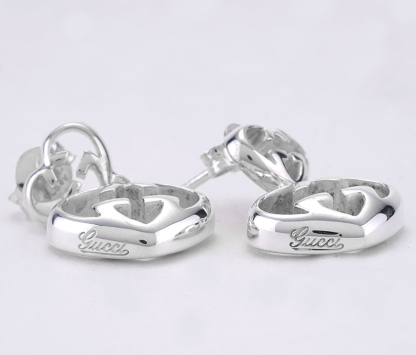 Love Britt G Heart Earrings in Silver