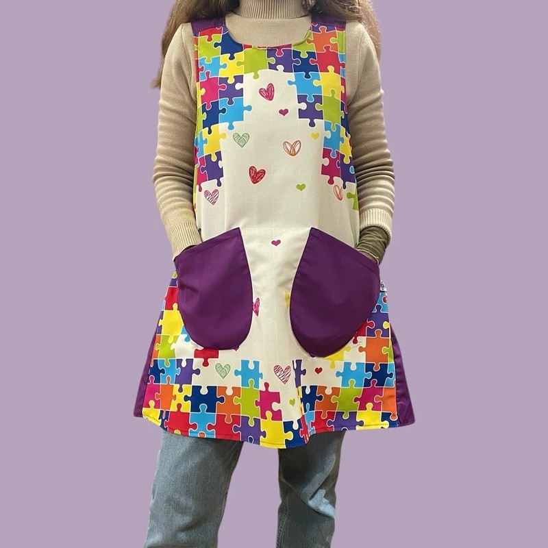 Dropped Puzzles Cross Strap Apron