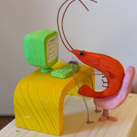 shrimp working on the computer