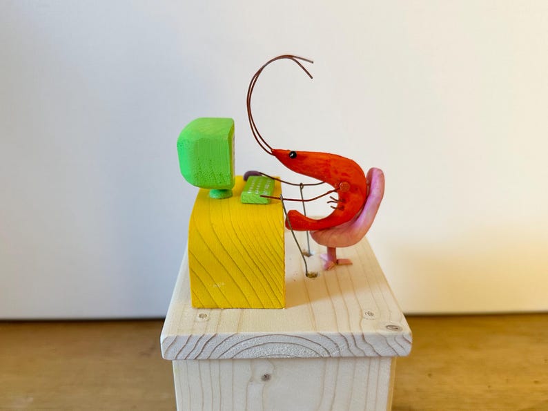 shrimp working on the computer