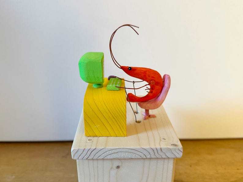 shrimp working on the computer