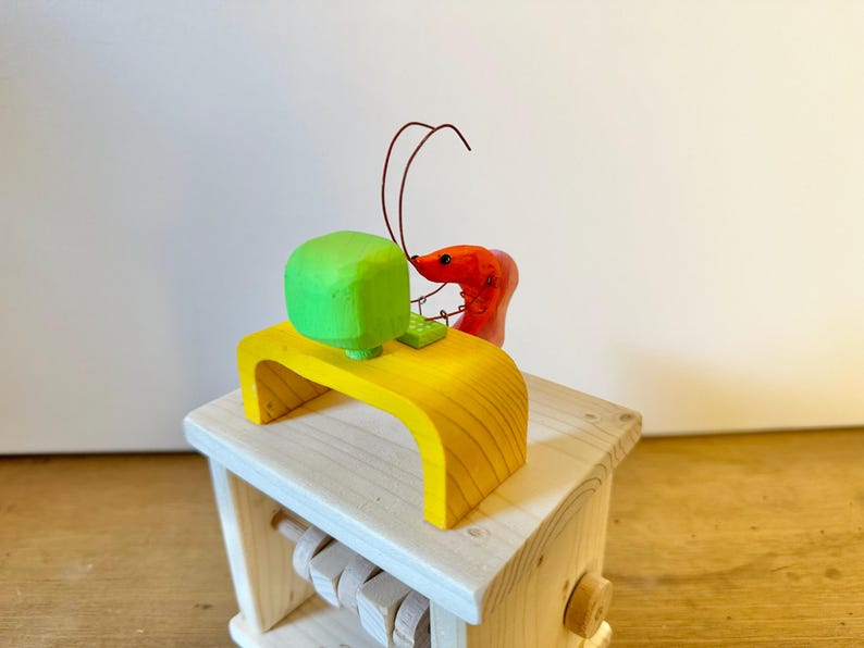 shrimp working on the computer