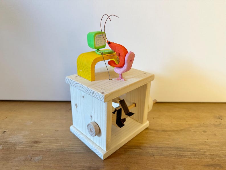 shrimp working on the computer