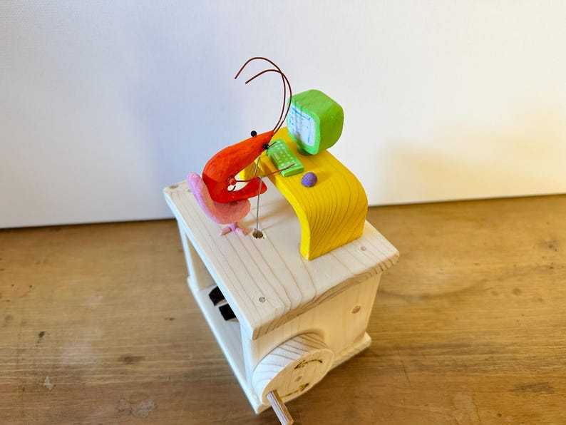 shrimp working on the computer