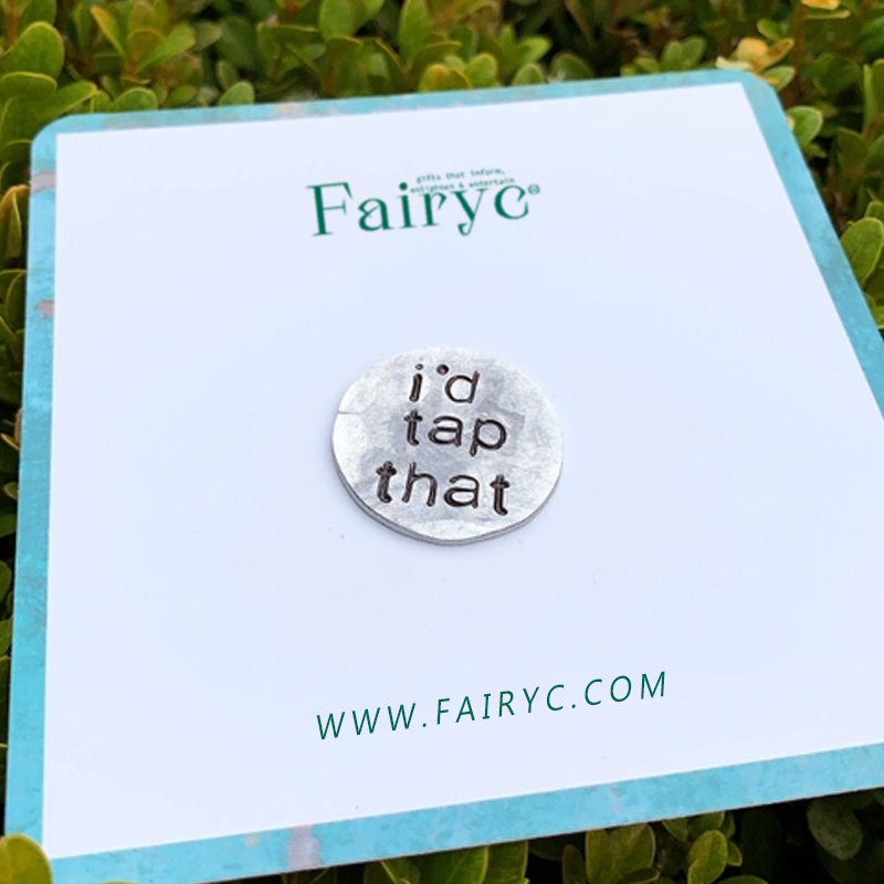 Fun hand embossed golf ball marker
