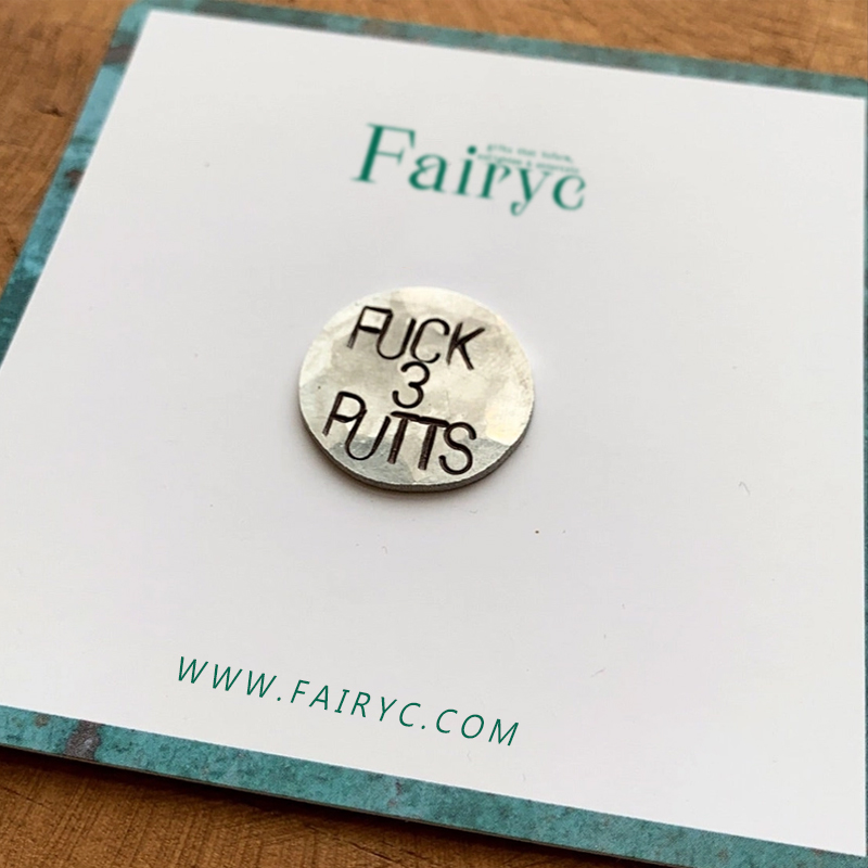 Fun hand embossed golf ball marker