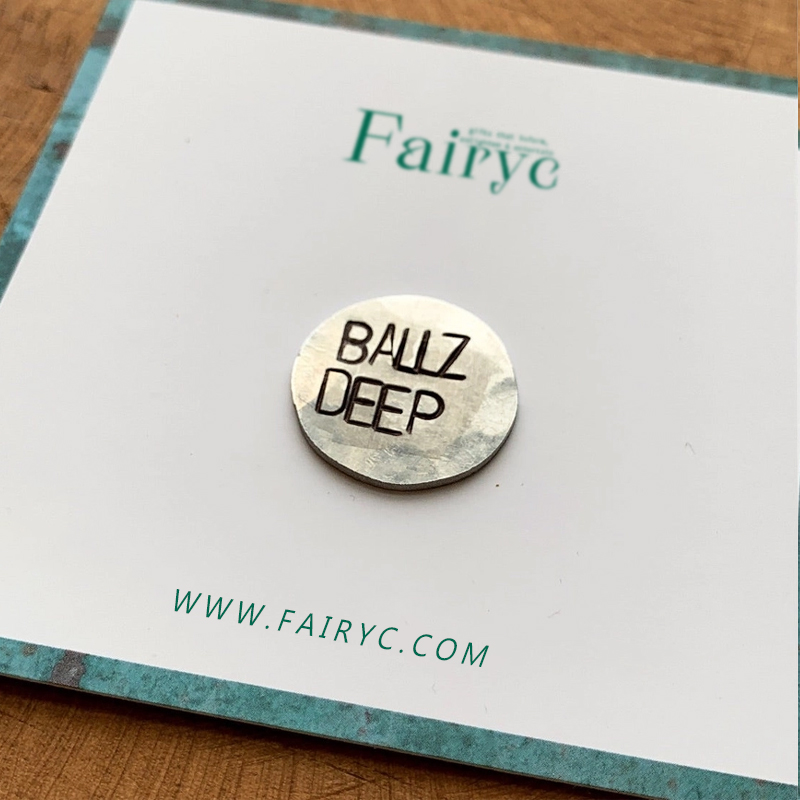 Fun hand embossed golf ball marker