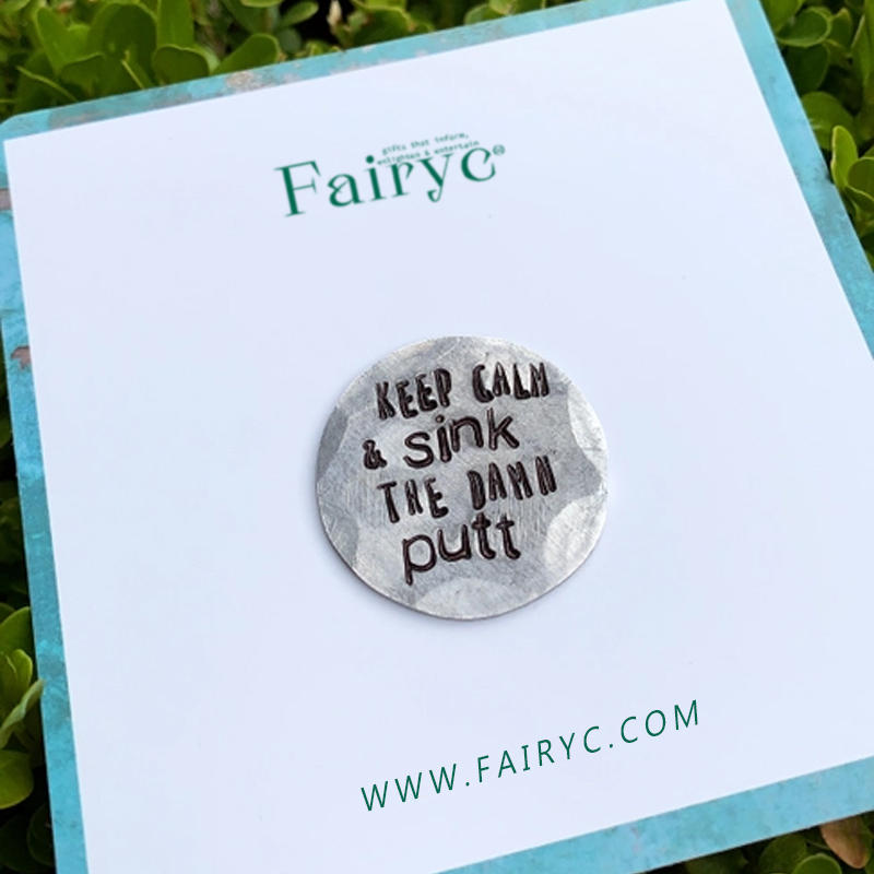 Fun hand embossed golf ball marker