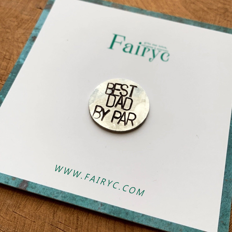 Fun hand embossed golf ball marker
