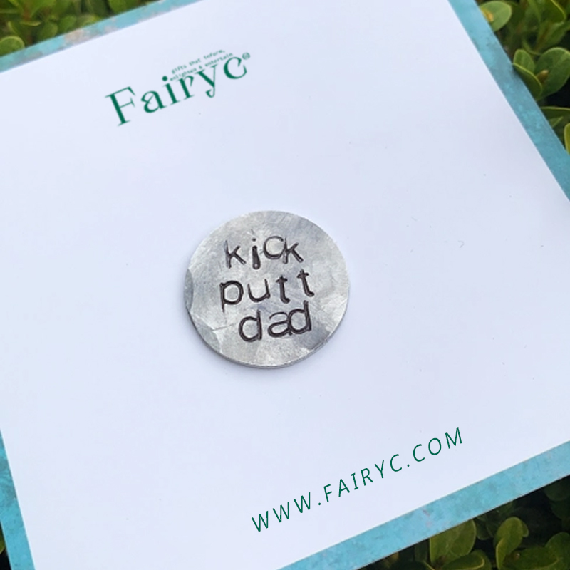 Fun hand embossed golf ball marker