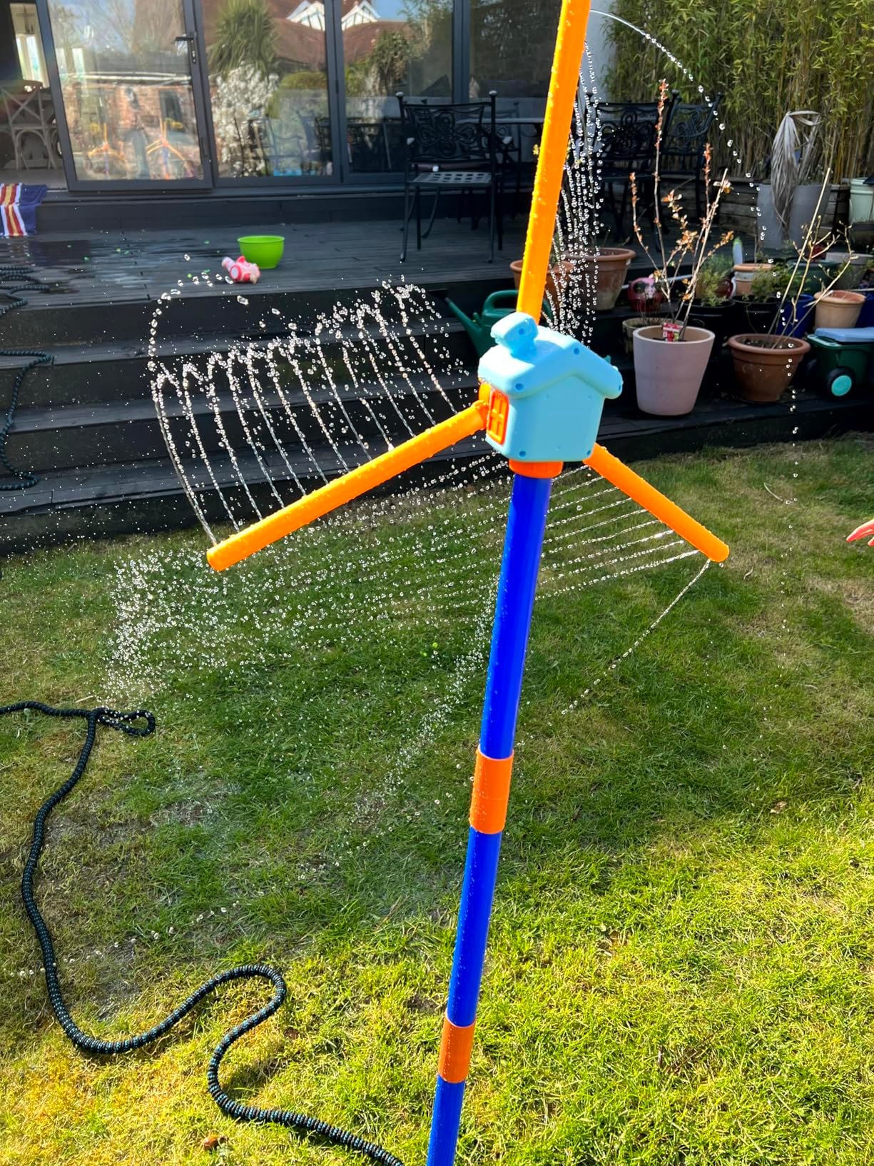 Fun but limited longevity. Water pools in front of windmill. Not suitable to water garden.