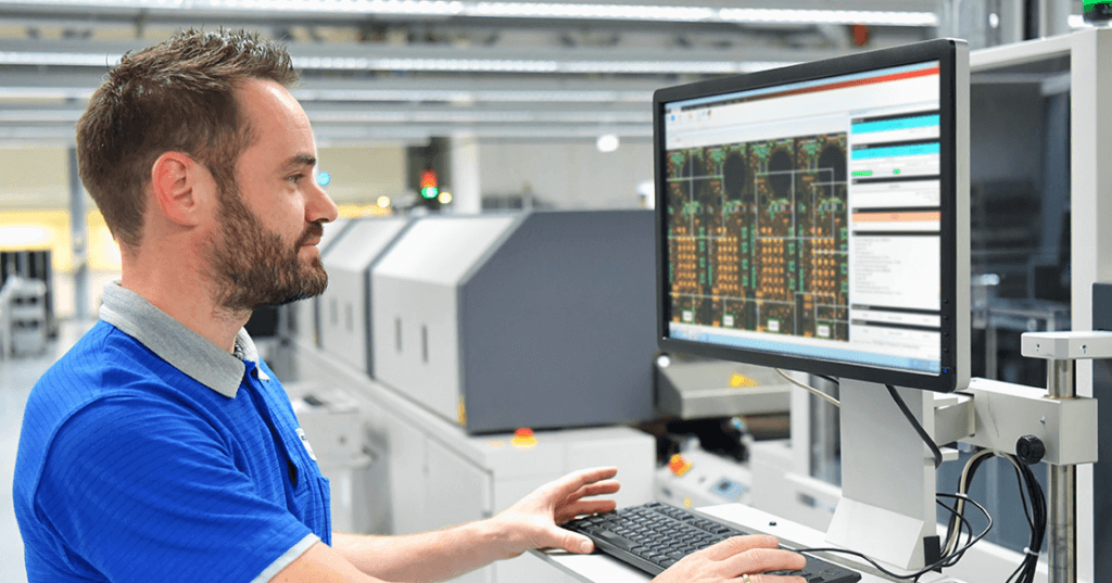 TopAutoDevice - a PLC programmer watching his computer