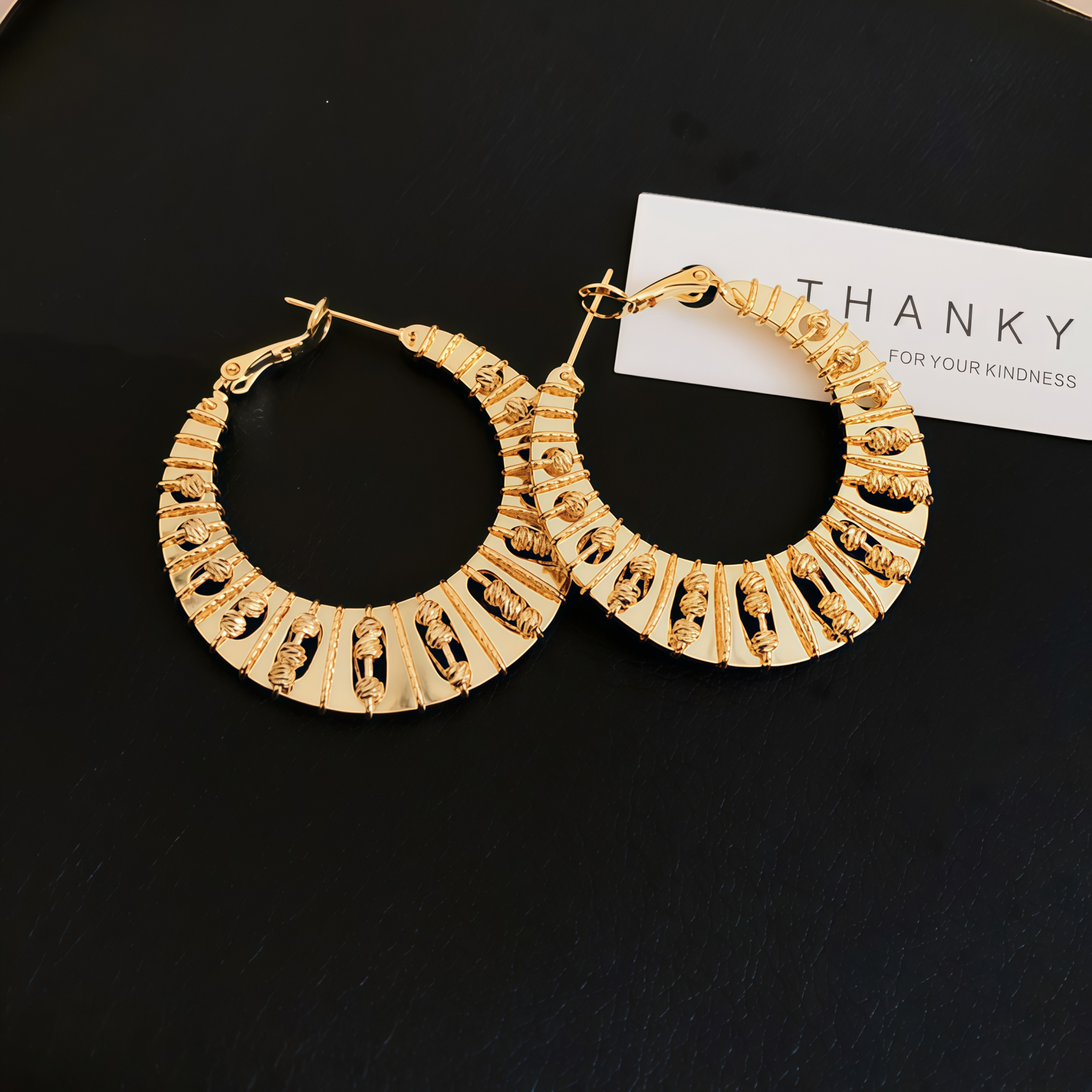 Gilded Twist Hoops- Where Nature Meets Glamour