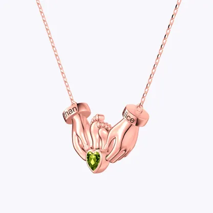Custom Heart Shape Birthstone Name Necklace featuring Parents' Hands Cradling Baby Feet