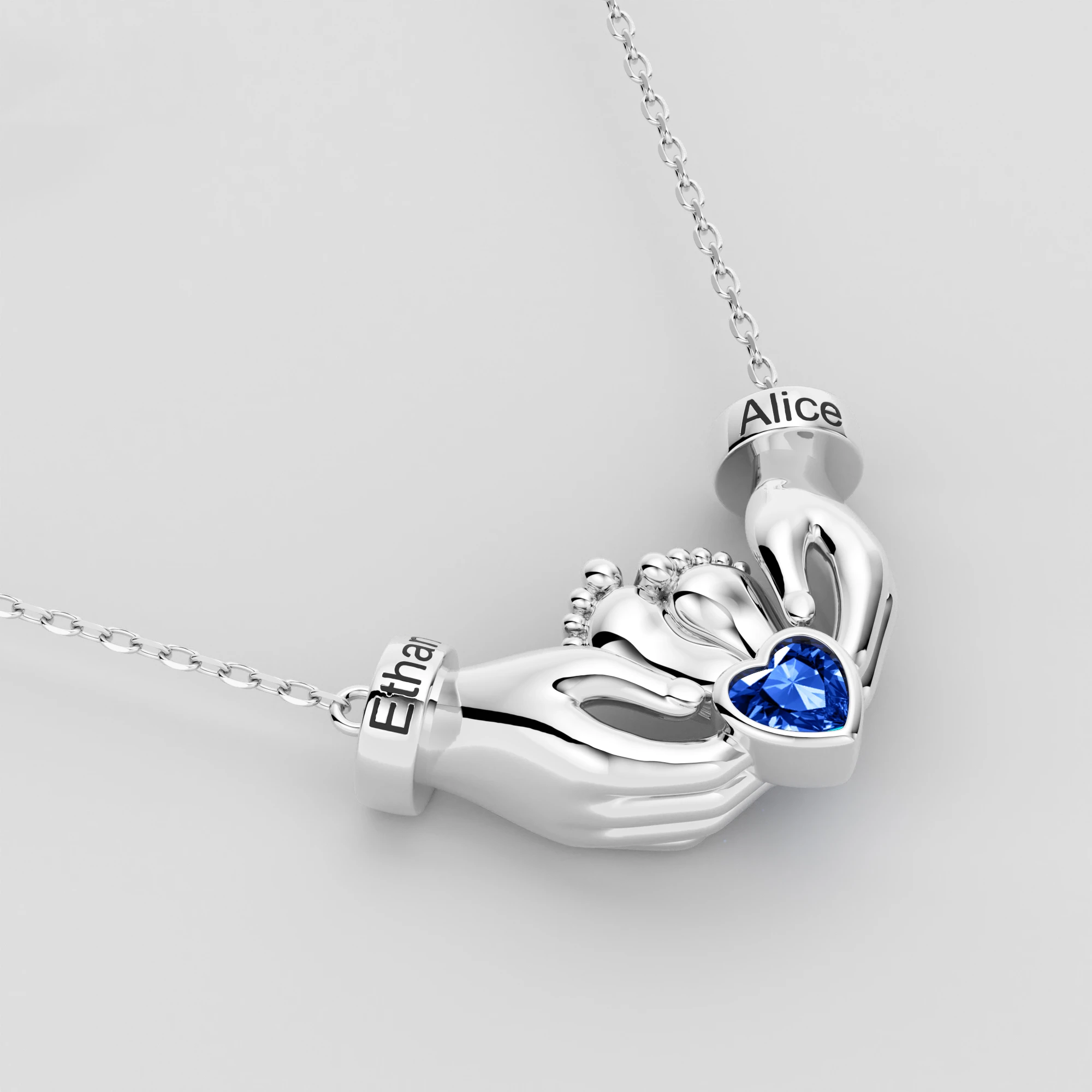 Custom Heart Shape Birthstone Name Necklace featuring Parents' Hands Cradling Baby Feet