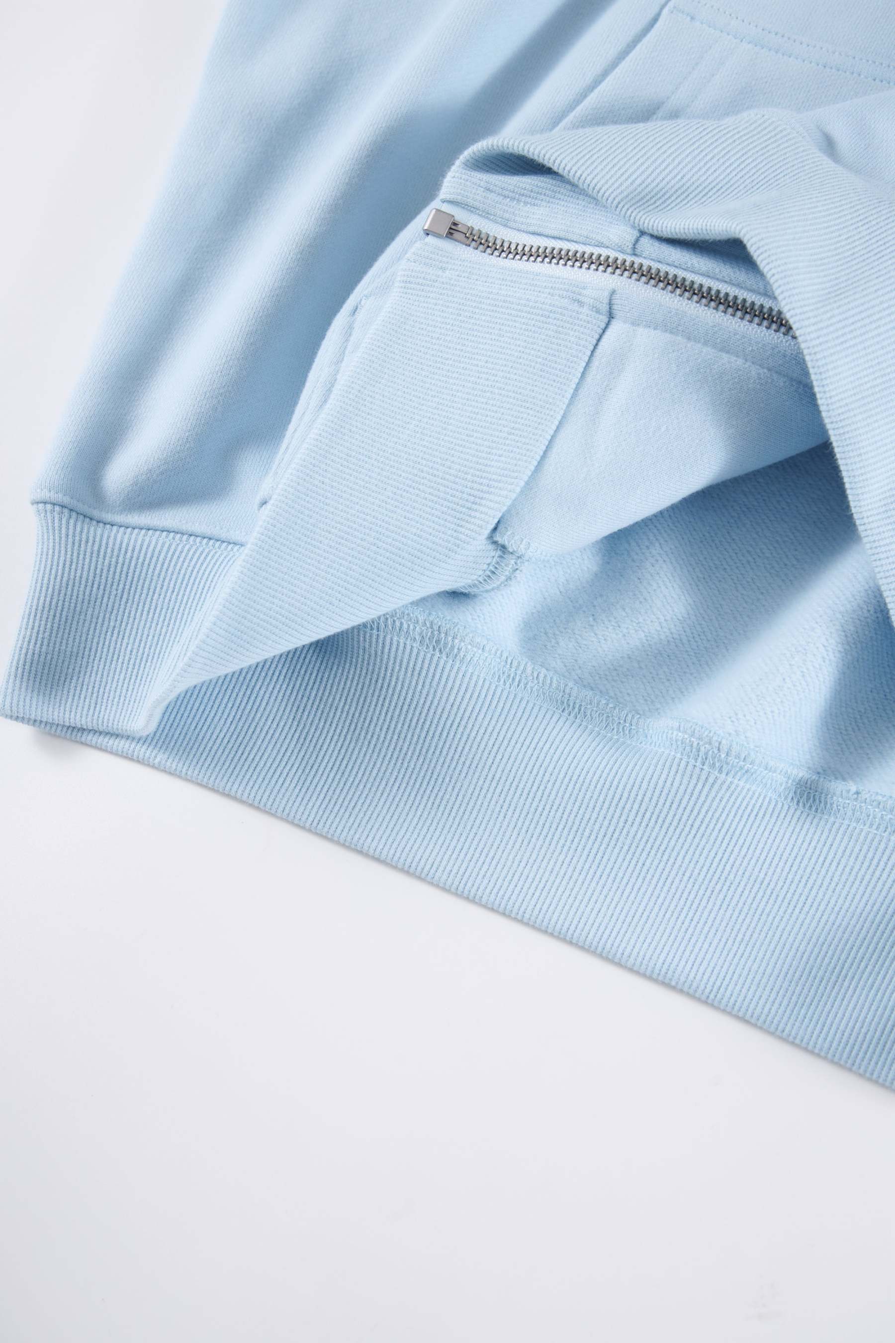 BABY BLUE RHINESTONE ZIP-Fineriform