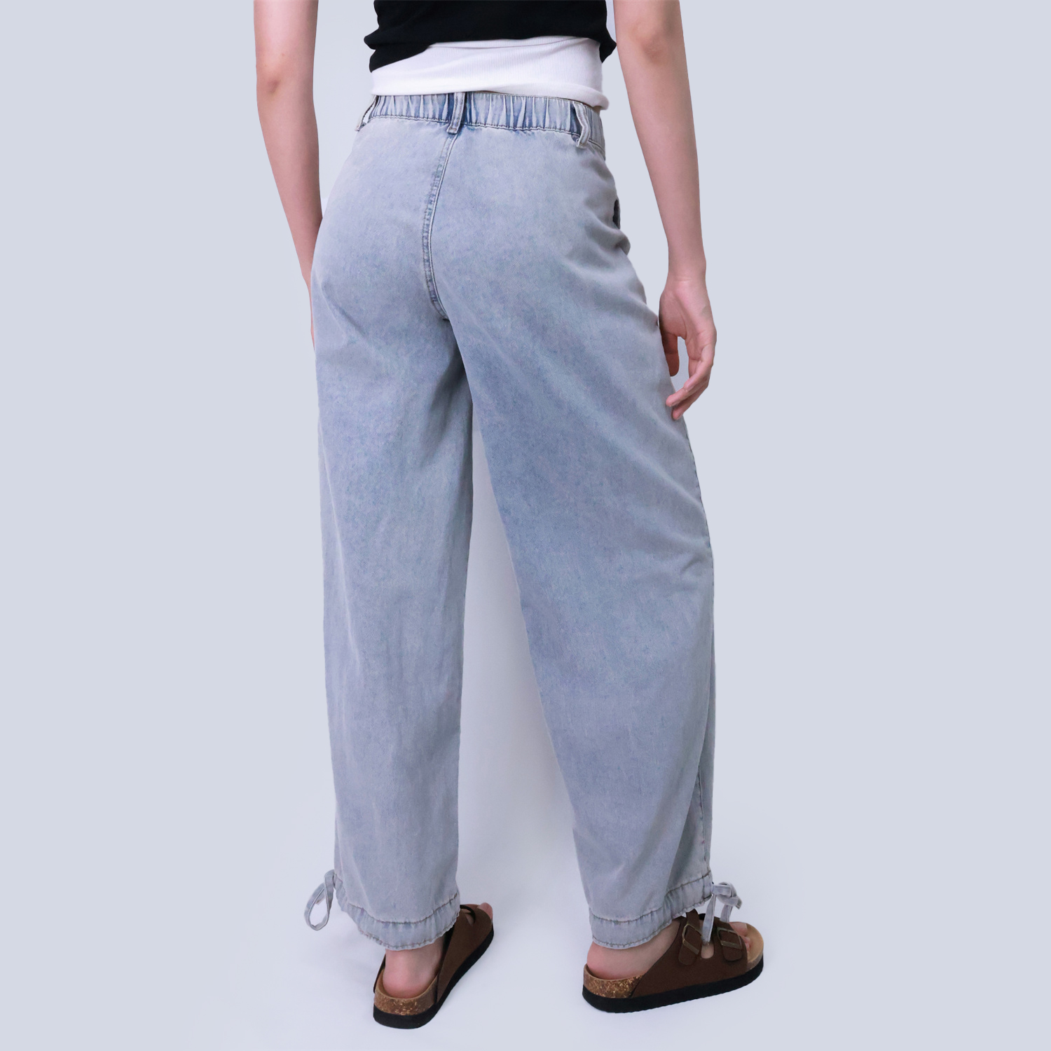 Pwest Stretchy mid-rise front pockets Comfortably loose ankle ties Lotus Tube Jeans