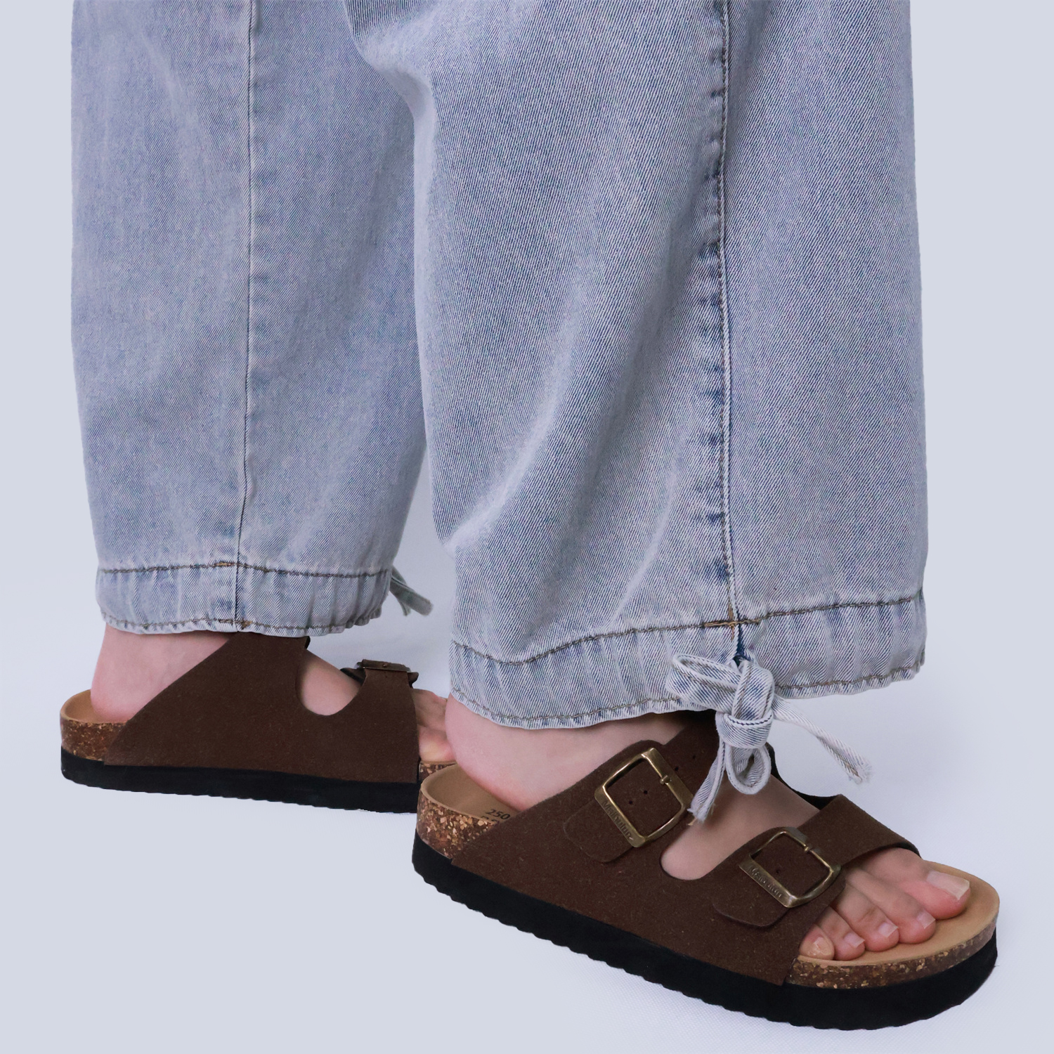 Pwest Stretchy mid-rise front pockets Comfortably loose ankle ties Lotus Tube Jeans